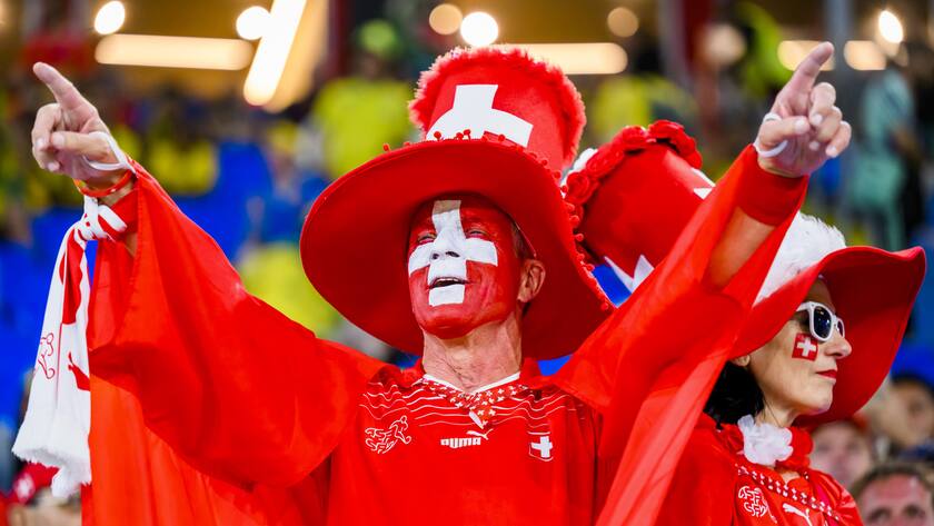 Swiss fans celebrate during the FIFA World Cup Qatar 2022 group G soccer match between Brazil and Switzerland at the Stadium 974, in Doha, Qatar, Monday, November 28, 2022. (KEYSTONE/Laurent Gillieron)