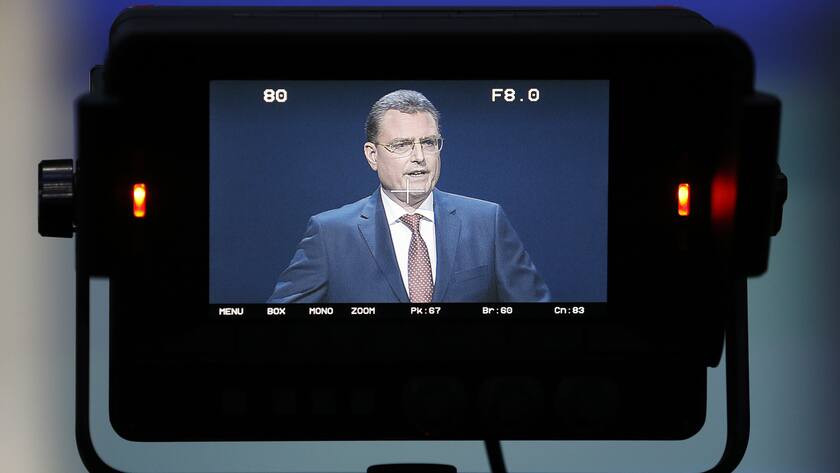 Thomas Jordan, President of the Swiss Nationalbank SNB, is displayed on a camera screen while he speaks during the general assembly, Friday, April 27, 2018 in Bern, Switzerland. (KEYSTONE/Peter Klaunzer)