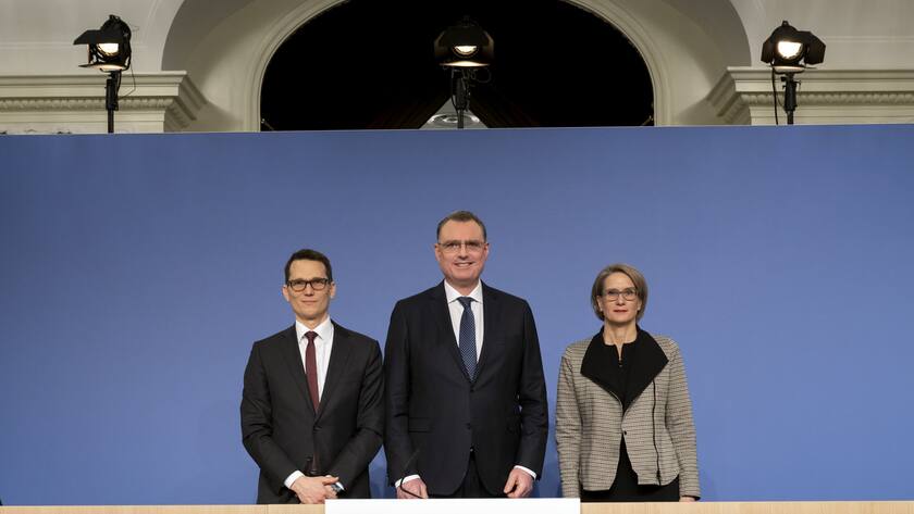 Swiss National Bank's (SNB) Vice Chairman of the Governing Board Martin Schlegel, Swiss National Bank's (SNB) Chairman of the Governing Board Thomas Jordan, and Swiss National Bank's (SNB) Member of the Governing Board Andrea Maechler, from left, take a pose after an end-of-year press conference of Swiss National Bank (SNB BNS), in Bern, Switzerland, Thursday, December 15, 2022. (KEYSTONE/Anthony Anex)