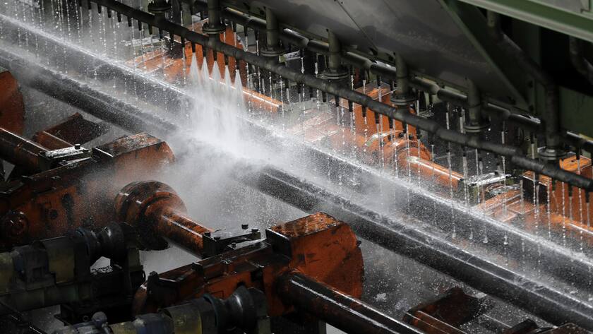 A seamless pipe goes through a cooling bed at the Tenaris pipe mill Wednesday, June 6, 2018, in Bay City, Texas. Tenaris, which imports steel from it's facilities around the world, is seeking an exemption from the steel tariff. (AP Photo/David J. Phillip)