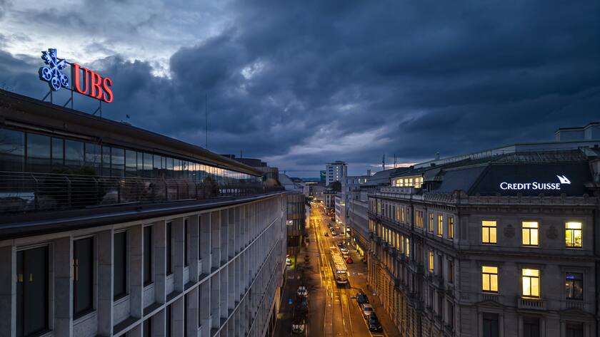 An aerial view shows the headquarters of the Swiss banks Credit Suisse, right, and UBS, left, at Paradeplatz in Zurich, Switzerland on Sunday March 19, 2023. (KEYSTONE/Michael Buholzer).