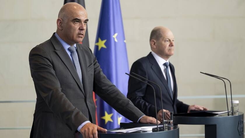 Swiss Federal President Alain Berset, left, speaks next to German Chancellor Olaf Scholz, right, during a media conference after a work meeting at the Chancellery, in Berlin, Germany, on Tuesday, April 18, 2023. (KEYSTONE/Anthony Anex)