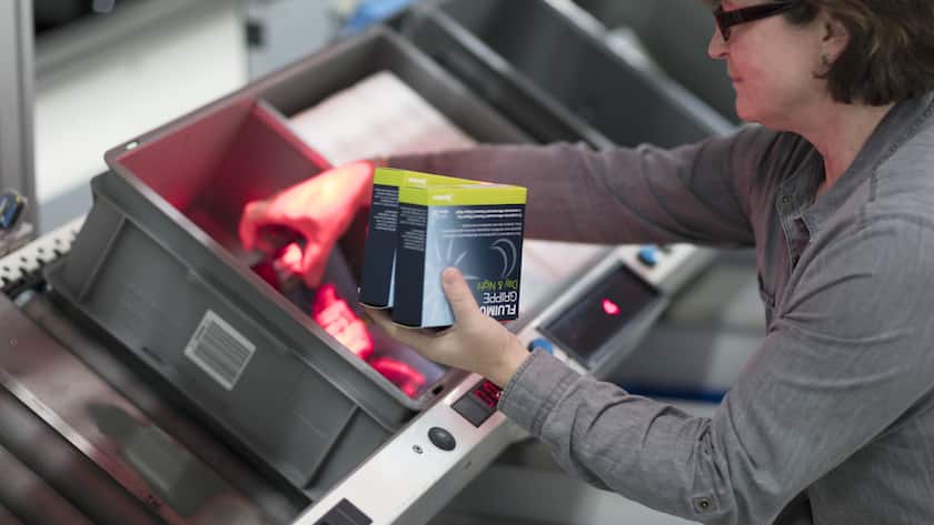 An employee prepares pharmaceuticals which will be sent to customers, pictured at the logistics center of the mail-order pharmacy Zur Rose in Frauenfeld, Canton of Thurgau, Switzerland, on November 17, 2016. The mail-order pharmacy Zur Rose sends pharmaceuticals to physicians and directly to individual customers when prescriptions are produced. (KEYSTONE/Gaetan Bally)