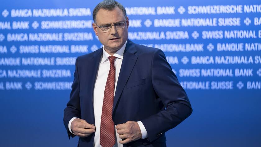 Swiss National Bank's (SNB) Chairman of the Governing Board Thomas Jordan ties his suit at the end of 115. Ordinary General Assembly of Swiss National Bank (SNB), at Bern, Switzerland, this Friday, April 28, 2023. (KEYSTONE/Anthony Anex)