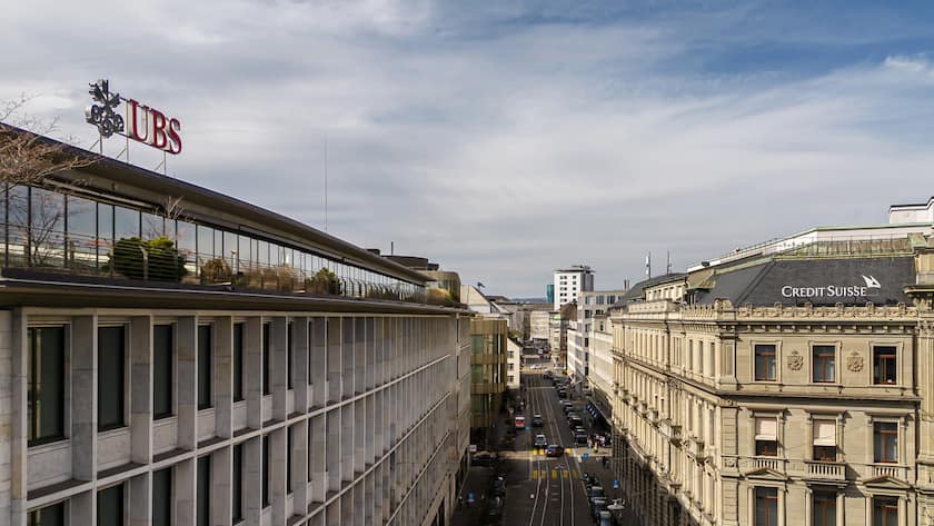 A general view shows the headquarters of the Swiss bank Credit Suisse, right, and UBS, left, at Paradeplatz in in Zurich, Switzerland on Saturday, March 18, 2023. (KEYSTONE/Michael Buholzer).