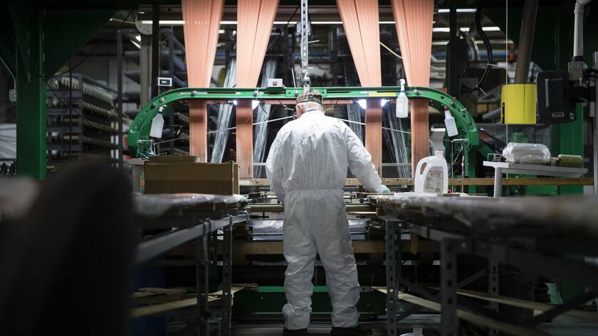 A workman operates a loom manufacturing composite parts for joints in aircrafts at Bally Ribbon Mills in Bally, Pa., Thursday, March 23, 2017. (AP Photo/Matt Rourke)