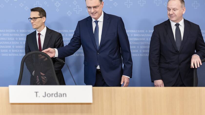 Swiss National Bank's (SNB) Chairman of the Governing Board Thomas Jordan, center, arrives with Vice Chairman of the Governing Board Martin Schlegel, left, and deputy Member of the Governing Board Thomas Moser, right, for a media briefing at the Swiss National Bank in Zurich, Switzerland, on Thursday, September 20, 2023. (KEYSTONE/Michael Buholzer).