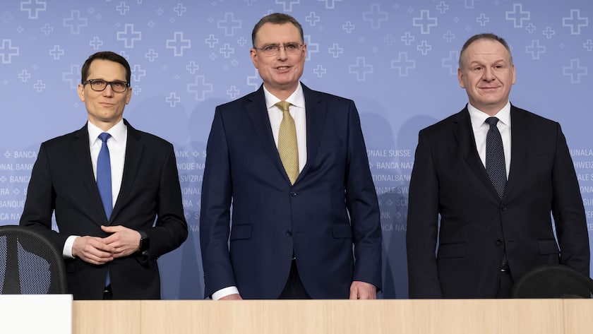 Vice Chairman of the Governing Board Martin Schlegel, Swiss National Bank's (SNB) Chairman of the Governing Board Thomas Jordan, and Deputy Member of the Governing Board Thomas Moser, from left to right, take a pose, during an end-of-year press conference of Swiss National Bank (SNB BNS), in Bern, Switzerland, Thursday, December 14, 2023. (KEYSTONE/Anthony Anex)