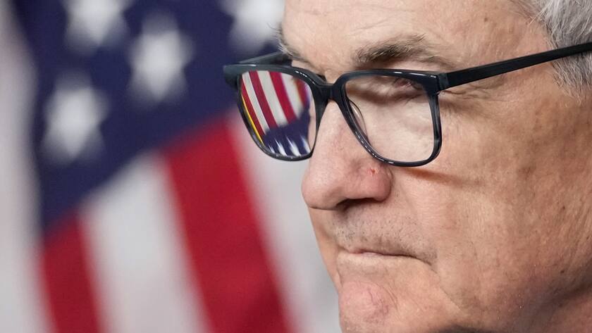 FILE - An American flag is seen in Federal Reserve Board Chair Jerome Powell's glasses as he speaks at a news conference at the Federal Reserve, Dec. 13, 2023, in Washington. On Wednesday, March 6, 2024, Powell testifies to the House Financial Services Committee on the first of two days of semi-annual testimony to Congress. (AP Photo/Alex Brandon, File).Jerome Powell