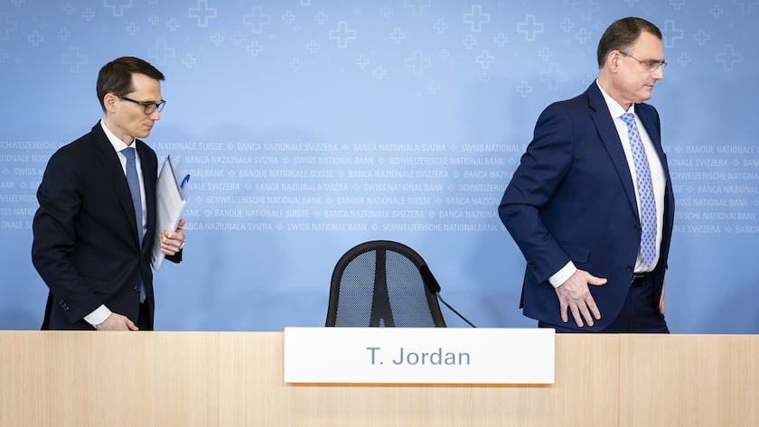 Swiss National Bank's (SNB) Chairman of the Governing Board Thomas Jordan, right, leaves a media briefing with Vice Chairman of the Governing Board Martin Schlegel, left, at the Swiss National Bank in Zurich, Switzerland, on Thursday, March 21, 2024. (KEYSTONE/Michael Buholzer).