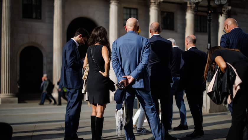 epa11612254 People walk in the financial district of the City of London, in London, Britain, 18 September 2024. International Equal Pay Day, observed on 18 September, highlights ongoing efforts to close the global gender pay gap due to longstanding inequalities and challenges in achieving equal pay for women. According to the United Nations, women are paid less than men, with the gender pay gap estimated at around 20 per cent globally. EPA/TOLGA AKMEN