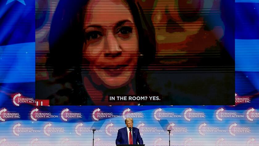 epa11679002 Former US president and Republican presidential nominee Donald Trump speaks at the Turning Point PAC campaign rally at the Gas South Arena, in Duluth, Georgia, USA, 23 October 2024. Trump is running against Democratic US Vice President Kamala Harris. EPA/ERIK S. LESSER