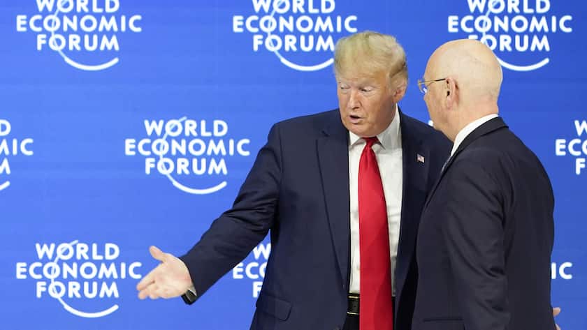 US President Donald Trump, left, and German Klaus Schwab, right, Founder and Executive Chairman of the World Economic Forum, WEF, leave the stage after addressing a plenary session during to the 50th annual meeting of the World Economic Forum, WEF, in Davos, Switzerland, Tuesday, January 21, 2020. The meeting brings together entrepreneurs, scientists, corporate and political leaders in Davos from January 21 to 24. (KEYSTONE/Gian Ehrenzeller)