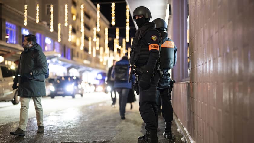 Special police is on guard prior the arrival of Volodymyr Zelenskyy, President of Ukraine, at the Ukraine House on the Obere Promenade road, on the sideline of the 54th annual meeting of the World Economic Forum, WEF, in Davos, Switzerland, Tuesday, January 16, 2024. The meeting brings together entrepreneurs, scientists, corporate and political leaders in Davos under the topic "Rebuilding Trust" from 15 to 19 January. (KEYSTONE/Gian Ehrenzeller)