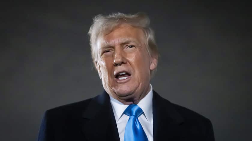 President Donald Trump speaks to reporters next to Air Force One after arriving back at Joint Base Andrews, Md., Sunday, Feb. 2, 2025. (AP Photo/Ben Curtis)