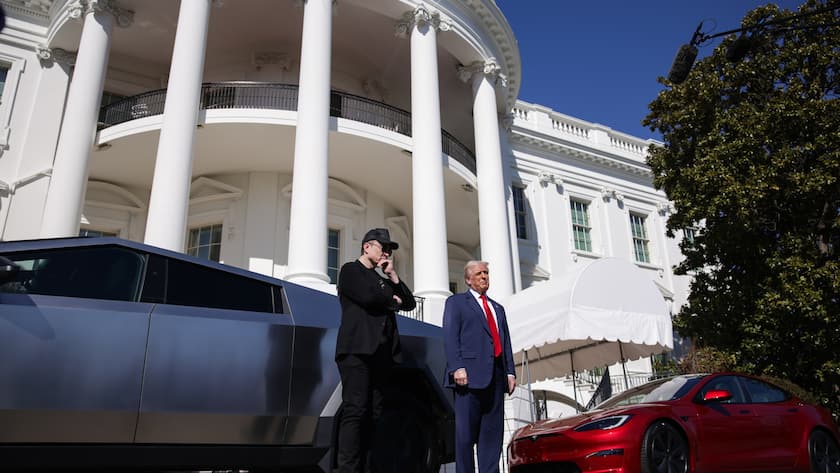epa11957016 Tesla CEO and Senior Advisor to the President of the United States Elon Musk (L) looks on as US President Donald Trump (R) speaks in front of Tesla vehicles at the White House in Washington, D.C., USA, 11 March 2025. President Trump has said he will buy a Tesla to support Tesla and Elon Musk after recent attacks on Tesla charging stations and calls for boycotts of Tesla products. EPA/SAMUEL CORUM / POOL