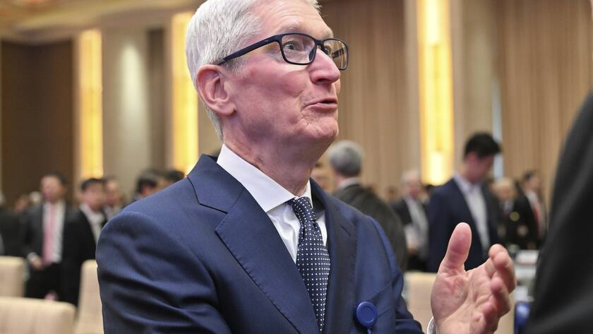 Tim Cook, CEO of Apple attends an opening ceremony of the China Development Forum at the Diaoyutai Guesthouse in Beijing Sunday, March 23, 2025. (Adek Berry/Pool Photo via AP)