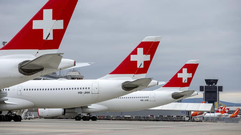 A large number of Swiss International Air Lines aircrafts and easyJet aircrafts are parked on the tarmac of the Geneve Aeroport, in Geneva, Switzerland, Monday, March 30, 2020. EasyJet, a British low-cost airline, on 30 March 2020 said it is ground its entire fleet of more than 300 planes and also a large number of flights of Swiss International Air Lines have been cancelled and part their fleet grounding at the airport. (KEYSTONE/Salvatore Di Nolfi)