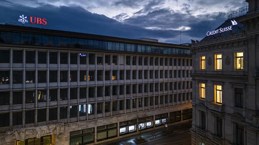An aerial view shows the headquarters of the Swiss banks Credit Suisse, right, and UBS, left, at Paradeplatz in Zurich, Switzerland on Sunday March 19, 2023. (KEYSTONE/Michael Buholzer).