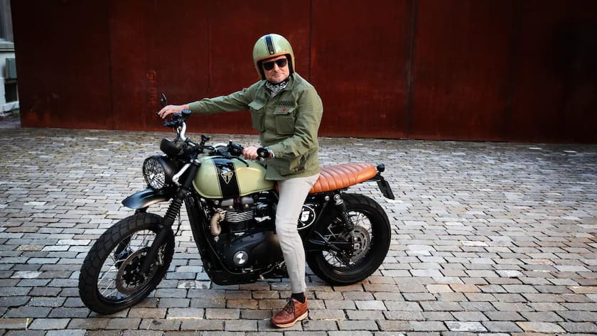 Breitling-Chef Georges Kern auf einem Motorrad