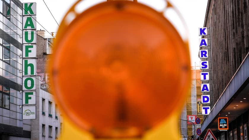 epa08337543 A view of the department stores of Karstadt (R) and Kaufhof (L) in Duesseldorf, Germany, 01 April 2020. According to media reports, the department store chain Galeria Karstadt Kaufhof is to apply for financial aid due to the ongoing pandemic of the COVID-19 disease caused by the SARS-CoV-2 coronavirus. EPA/SASCHA STEINBACH