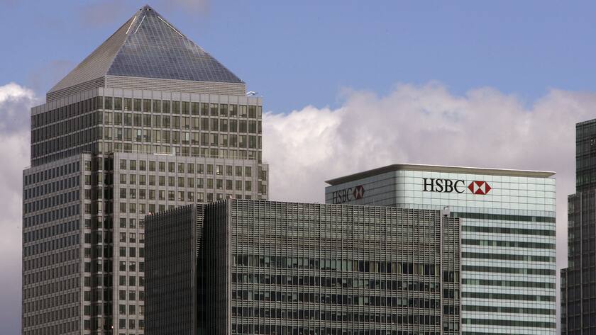 The HSBC building is seen in the docklands, London, Monday July 30, 2007. HSBC Holdings PLC, HSBC Holdings PLC, Europe's largest bank by market value, reported Monday that its first-half earnings rose by 25 percent and said the world economy remains strong, though there are risks ahead. (AP Photo/Kirsty Wigglesworth)