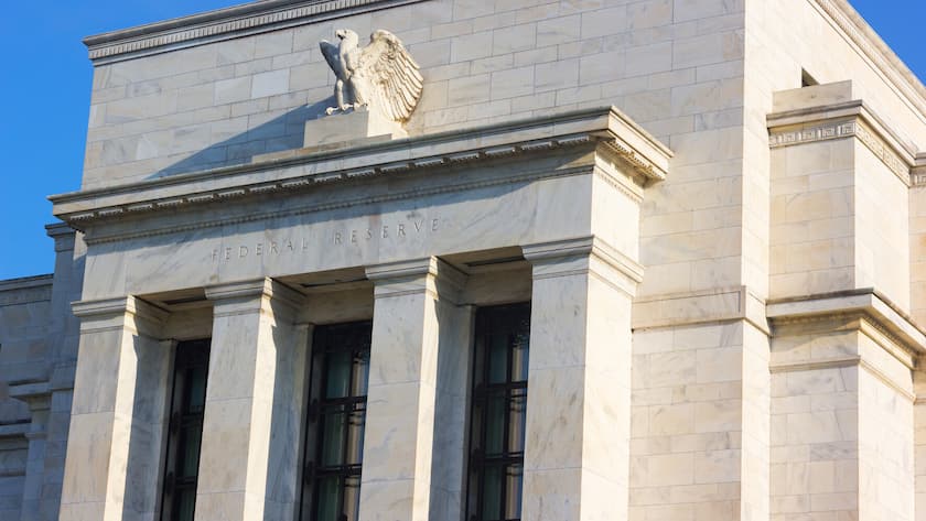 Federal Reserve building in Washington DC, US. Facade of the building with eagle statue in the morning.