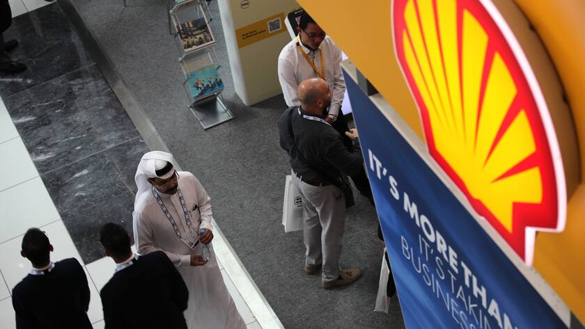 epa10276854 Visitors gather at Shell stand during the Abu Dhabi International Petroleum Exhibition and Conference (ADIPEC) in Abu Dhabi, United Arab Emirates, 31 October 2022. ADIPEC runs through 03 November 2022 with more than 2,200 exhibitors and 28 dedicated country pavilions showcasing their ambitions for the future of energy. EPA/ALI HAIDER