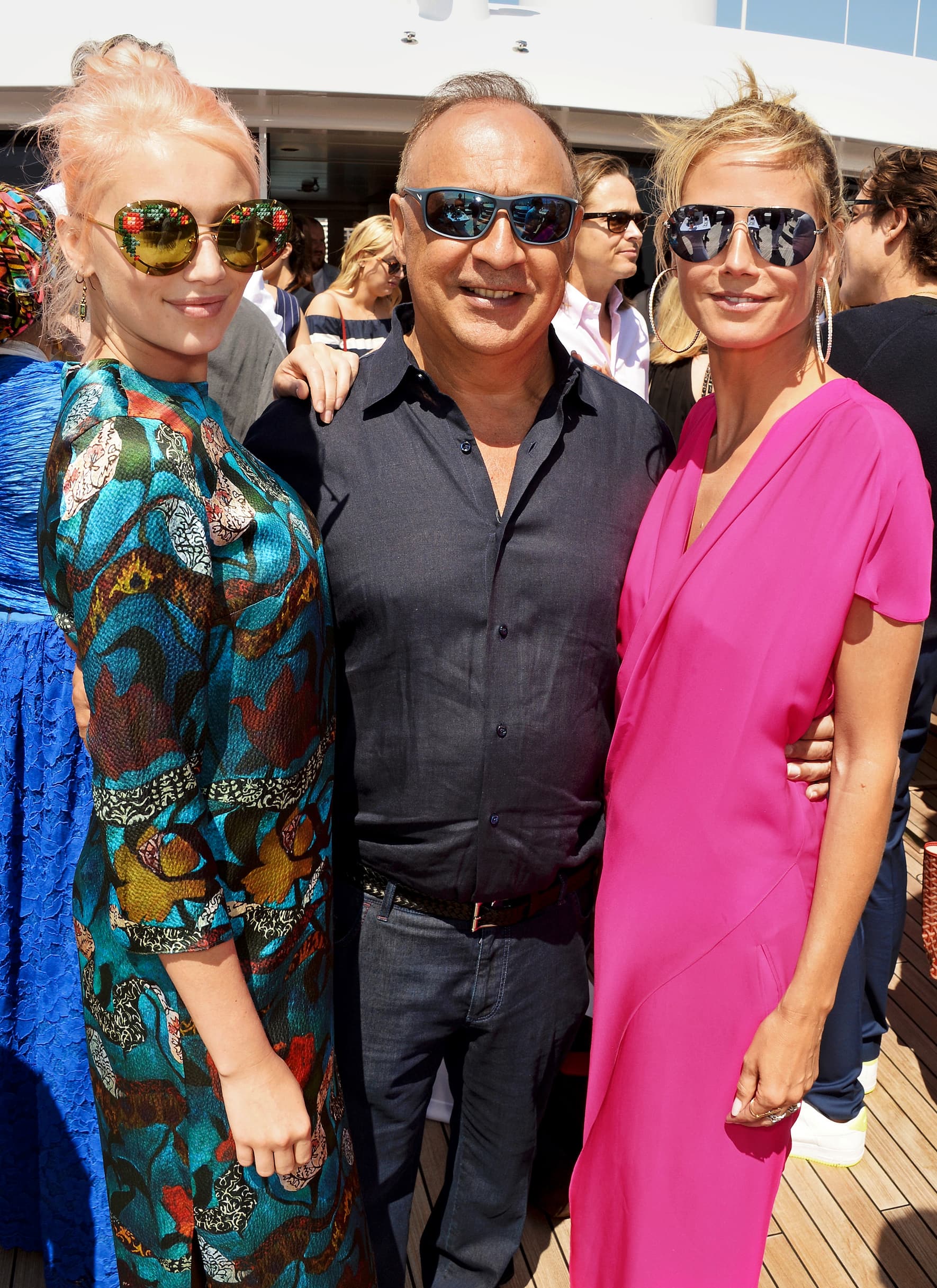 Mit seinem Studienkollegen Len Blavatnik (im Bild mit Musikerin Callin Russo und Ex-Model Heidi Klum), der damals schon längst Multimillionär ist, ergreift Vekselberg seine Chancen.