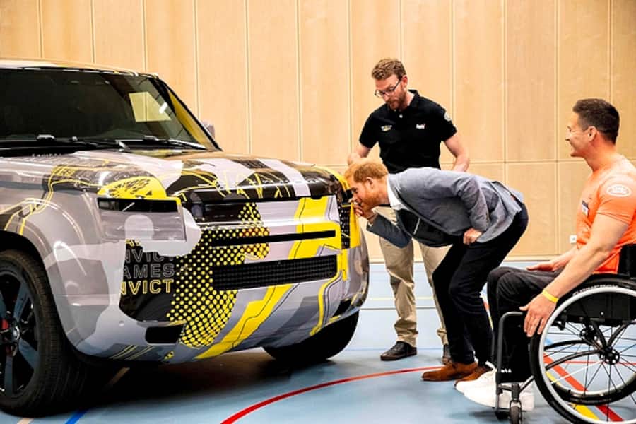 Prince Harry (C) looks at a car during the presentation of the Invictus Games The Hague 2020, in The Hague, Netherlands, on May 9, 2019. - The fifth Invictus Games The Hague 2020, an international sporting event for wounded, injured and sick servicepersonnel, will be held in the Zuiderpark in 2020. (Photo by patrick van katwijk / ANP / AFP) / Netherlands OUT (Photo credit should read PATRICK VAN KATWIJK/AFP/Getty Images)