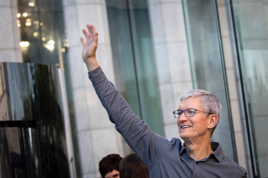 NEW YORK, NY - SEPTEMBER 20: Apple CEO Tim Cook waves to customers before they enter Apple's flagship 5th Avenue store to purchase the new iPhone 11 on September 20, 2019 in New York City. Apple's new iPhone 11 goes on sale today at the grand re-opening of the 5th Avenue store. (Photo by Drew Angerer/Getty Images)