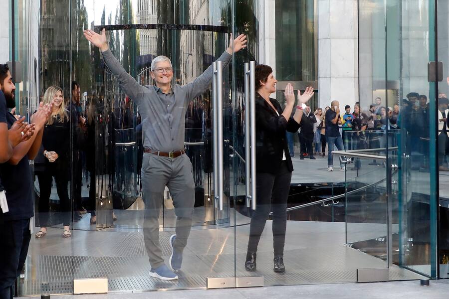NEW YORK, NEW YORK - SEPTEMBER 20: Apple CEO Tim Cook and Apple SVP Retail+People Deirdre O'Brien open the doors at the grand reopening of Apple's flagship Apple Fifth Avenue retail store on September 20, 2019 in New York City. (Photo by Taylor Hill/WireImage)