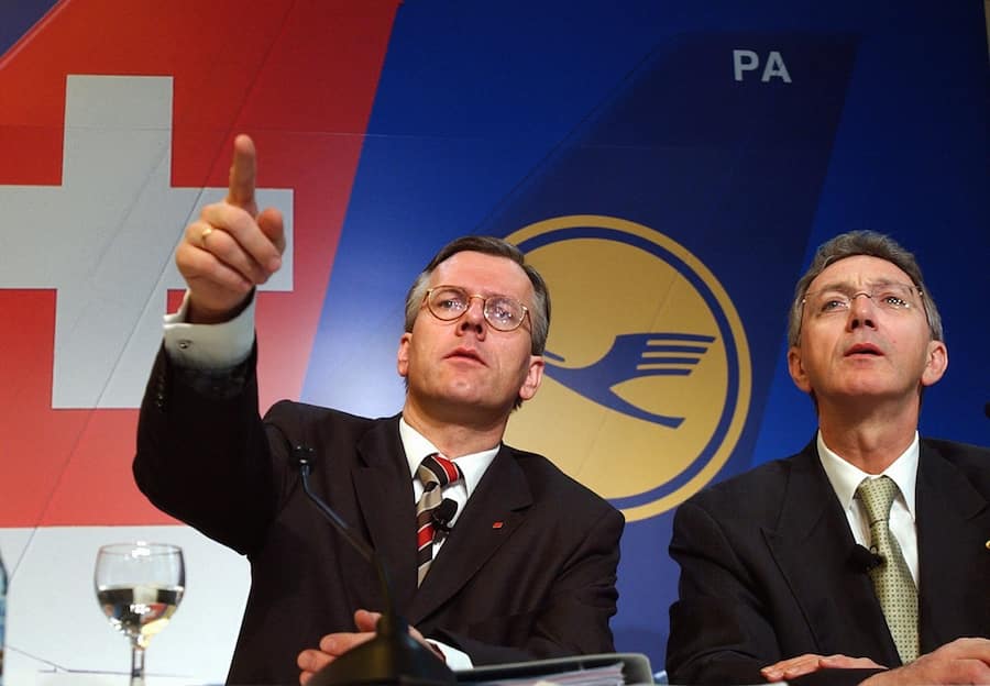 Swiss International Airlines CEO Christoph Franz, left, and Wolfgang Mayrhuber, CEO Lufthansa, answer questions during a press conference in Glattbrugg, Zurich, Switzerland, Wednesday, March 23, 2005. Franz and Mayrhuber answered questions about further details concerning the take over of Swiss International Airlines by German Lufthansa. (KEYSTONE/Steffen Schmidt)