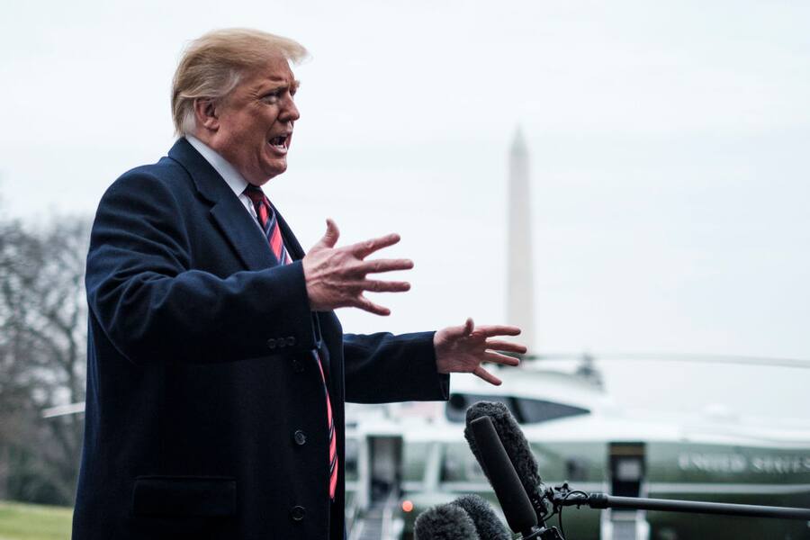 WASHINGTON, DC - JANUARY 19: U.S. President Donald Trump stops to speak to reporters as he prepared to board Marine One on the South Lawn of the White House on January 19, 2019 in Washington, DC. Trump is traveling to Dover Air Force Base in Delaware to visit with families four Americans who were killed in an explosion Wednesday in Syria. (Photo by Pete Marovich/Getty Images)