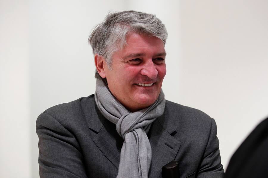 Former CEO of Global Wealth Management and Business Banking at UBS AG Raoul Weil shares a laugh with his lawyer during a break of the Swiss bank's trial at the Paris courthouse in Paris, Wednesday, Nov. 14, 2018. Swiss bank UBS AG stand trial in France for allegedly helping wealthy French clients evade the country's tax authorities. (AP Photo/Francois Mori)