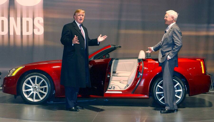 A photograph showing New York icon Donald Trump (L) helping General Motors Vice Chairman Bob Lutz introduce the new 2006 Cadillac XLR-V in 'under 5 seconds' at the New York International Auto Show Wednesday, 23 March 2005 at Javits Center. The show is open for a two-day media preview before opening to the general public on Friday 25 March. (KEYSTONE/EPA/STEVE FECHT) === ===