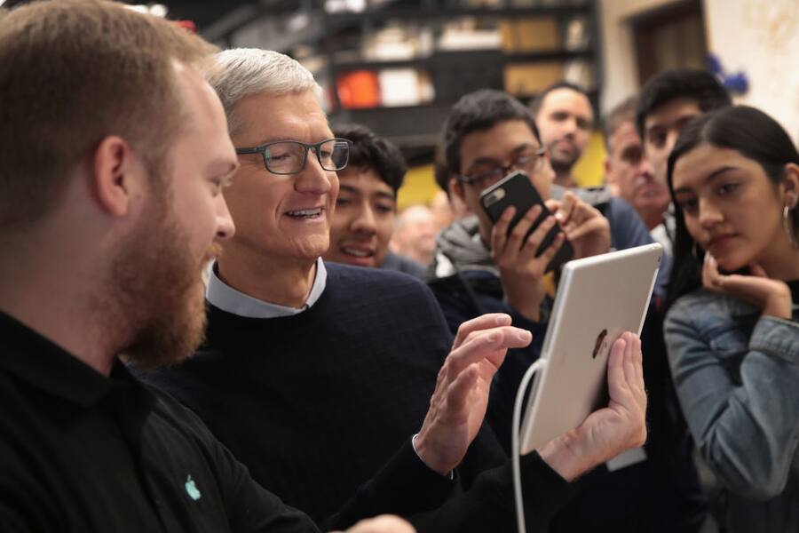 CHICAGO, IL - MARCH 27: Apple CEO Tim Cook gets a demonstration of an app during an event held to introduce the new 9.7-inch Apple iPad at Lane Tech College Prep High School on March 27, 2018 in Chicago, Illinois. The device will work with Apple Pencil and is available now. (Photo by Scott Olson/Getty Images)