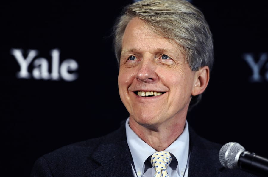 Economist, author and Yale University professor Robert Shiller smiles at a news conference, Monday, Oct. 14, 2013, in New Haven, Conn. Americans Shiller, Eugene Fama and Lars Peter Hansen have won the Nobel prize in economics. (AP Photo/Jessica Hill)