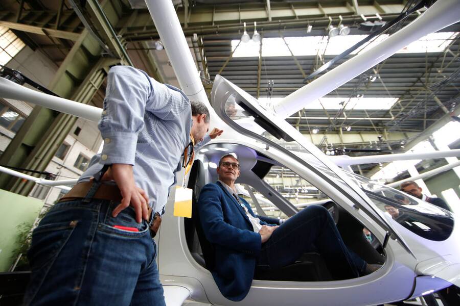 BERLIN, GERMANY - MAY 25: Michael Müller tries out a Volocopter during day 3 of the Greentech Festival at Tempelhof Airport on May 25, 2019 in Berlin, Germany. The Greentech Festival is the first festival to celebrate green technology and to accelerate the shift to more sustainability. The festival will take place from 23 to 25 May 2019 on the grounds of the former airport Berlin Tempelhof. (Photo by Axel Schmidt/Getty Images for Greentech Festival)
