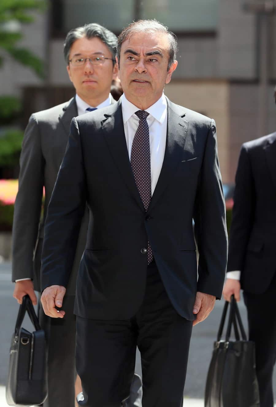 epa08007211 (FILE) - Former Nissan Motor Co. Chairman Carlos Ghosn arrives at Tokyo District Court in Tokyo, Japan, 23 May 2019 (reissued 19 November 2019). Ghosn was arrested on 19 November 2018 on allegations of financial misconduct. After 130 days in jail, he was released on bail only to be rearrested on new charges a month later. He was ultimately granted bail again. EPA/JIJI PRESS JAPAN OUT EDITORIAL USE ONLY NO ARCHIVES