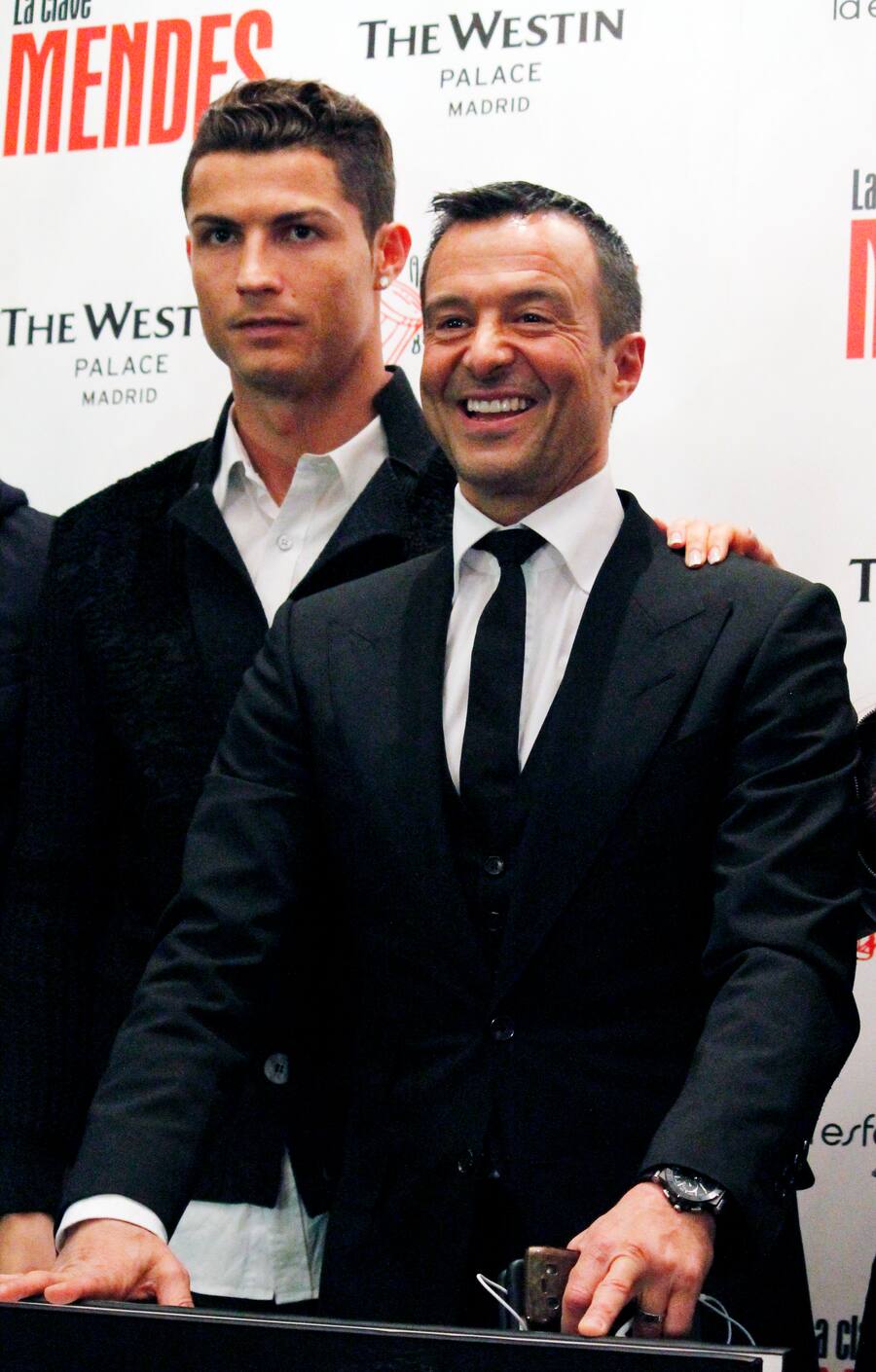 MADRID, SPAIN - JANUARY 22: Cristiano Ronaldo (L) attends the presentation of the book 'The Key to Mendes' ('La Clave Mendes') by sport agent Jorge Mendes (R) at Palace Hotel on January 22, 2015 in Madrid, Spain. (Photo by Europa Press/Europa Press via Getty Images)