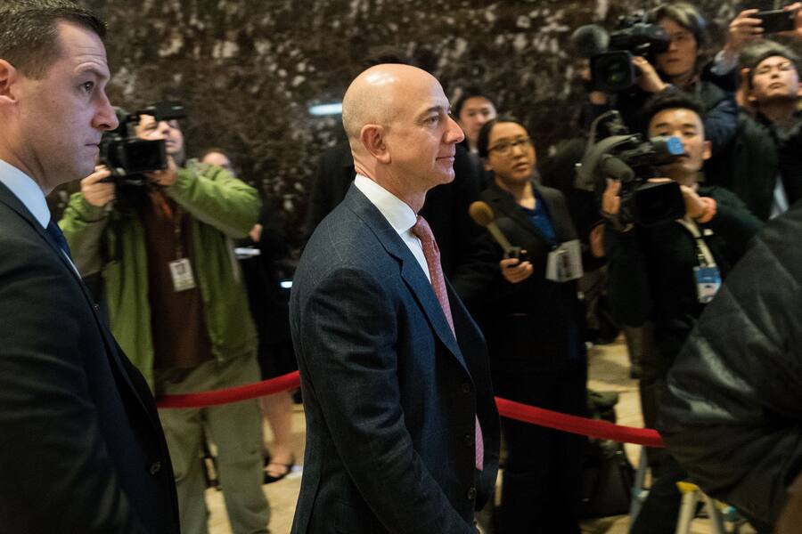 NEW YORK, NY - DECEMBER 14: Jeff Bezos, chief executive officer of Amazon, arrives for a meeting with President-elect Donald Trump at Trump Tower, December 14, 2016 in New York City. This is the first major meeting between President-elect Trump and technology industry leaders. (Photo by Drew Angerer/Getty Images)