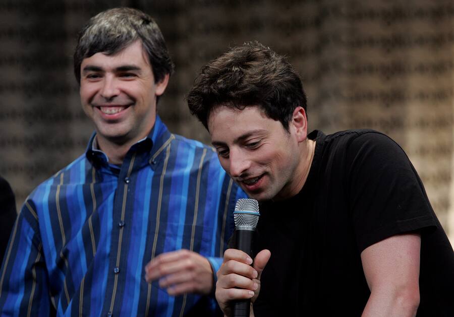 MOUNTAIN VIEW, CA - MAY 10: Google founders Larry Page (L) Sergey Brin talk with members of the media at Google Press Day 2006 May 10, 2006 in Mountain View, California. (Photo By Justin Sullivan/Getty Images)