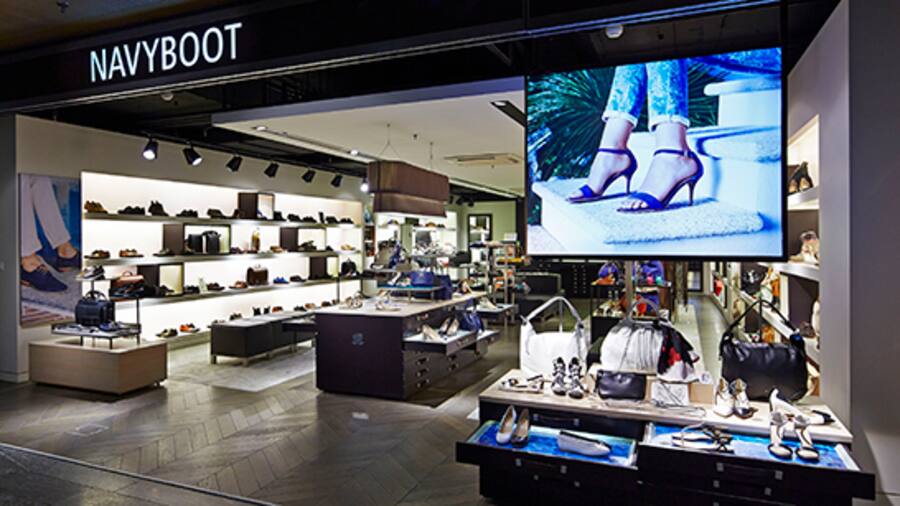 Navyboot-Laden am Flughafen Zürich: Wechselt von der Gaydoul Group zu Globus.