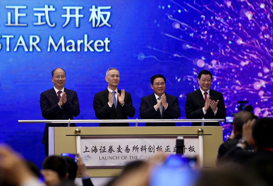 epa07644933 (L-R) Yi Huiman, Chairman of China Securities Regulatory Commission, Liu He, Vice Premier, Li Qiang, top Party official of Shanghai, and Ying Yong, Shanghai's mayor, celebrate the launch of the SSE STAR Market, previously referred to as the Shanghai Stock Exchange science and technology innovation board, in Shanghai, China, 13 June 2019. The board will commence trading within two months. EPA/FEATURECHINA CHINA OUT