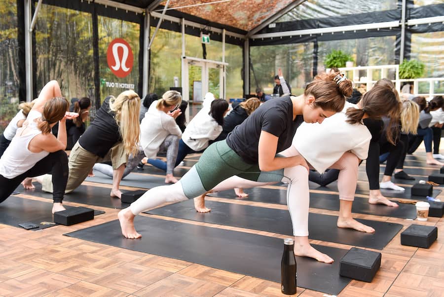 VANCOUVER, BC - OCTOBER 27: Yoga class at the Lululemon Yoga tent at In goop Health Vancouver at Stanley Park on October 27, 2018 in Vancouver, Canada. (Photo by Ernesto Distefano/Getty Images for goop)