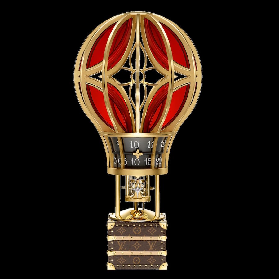 <p>Tischuhr Montgolfière Aéro: Ein Heissluftballon transportiert den kleinsten jemals von Louis Vuitton gestalteten Koffer, in dem ein mechanisches Uhrwerk arbeitet.</p>