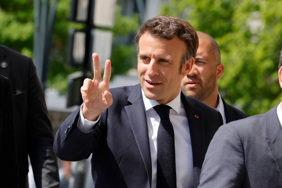 220421 -- SAINT-DENIS FRANCE, April 21, 2022 -- French President Emmanuel Macron C gestures during a campaign visit in Saint-Denis, north of Paris, France, on April 21, 2022. The runoff vote on April 24 will be between Emmanuel Macron and Marine Le P…
