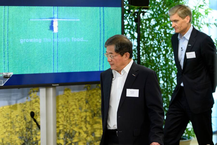 Ren Jianxin, left, chairman of ChemChina and futur Chairman of Syngenta and Erik Fyrwald, right, CEO of Syngenta arrive for a press conference of Syngenta after its acquisition by ChemChina, in Basel, Tuesday, June 27, 2017. The China National Chemical Corporation, or "ChemChina" has acquired the worlds biggest producer of agricultural chemicals, the Swiss agribusiness company Syngenta AG. (KEYSTONE/Laurent Gillieron)