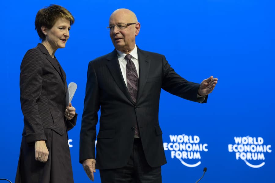 Simonetta Sommaruga, left, speaks with German Klaus Schwab, right, founder and president of the World Economic Forum, WEF,during the opening session on the first day of the 45th Annual Meeting of the World Economic Forum, WEF, in Davos, Switzerland, Wednesday, January 21, 2015. The overarching theme of the Meeting, which takes place from 21 to 24 January, is "The New Global Context". (KEYSTONE/Laurent Gillieron)
